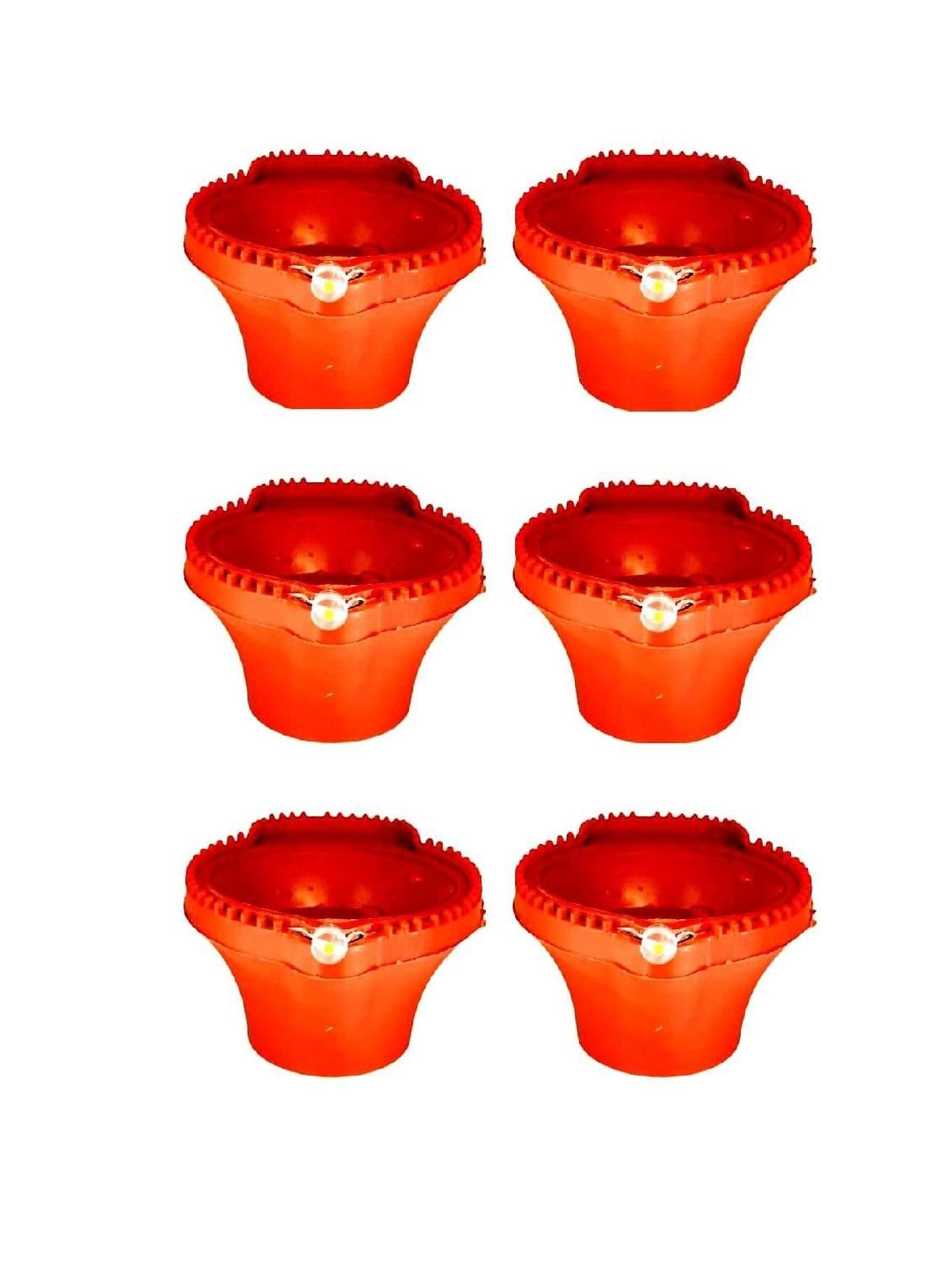 Set of six red plastic cups with lids on a white background