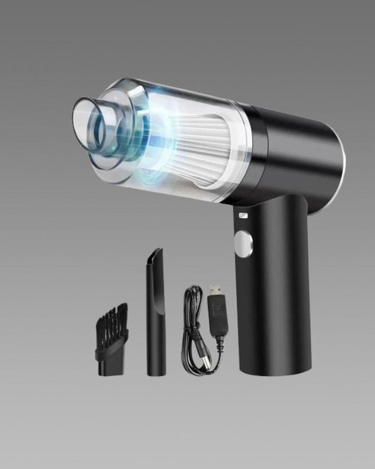 Black handheld vacuum cleaner with attachments on a gray background