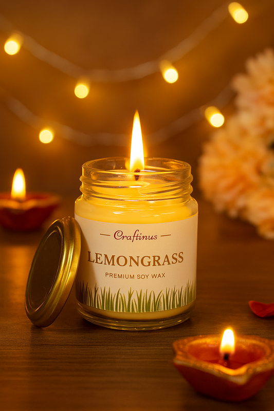 Crafinus Lemongrass candle in a jar with a warm glow on a wooden surface.